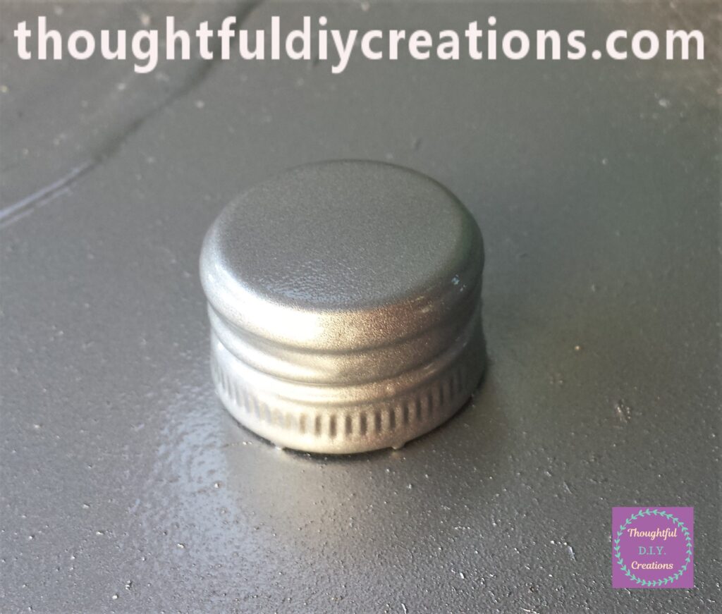 The lid spray painted for the second time.