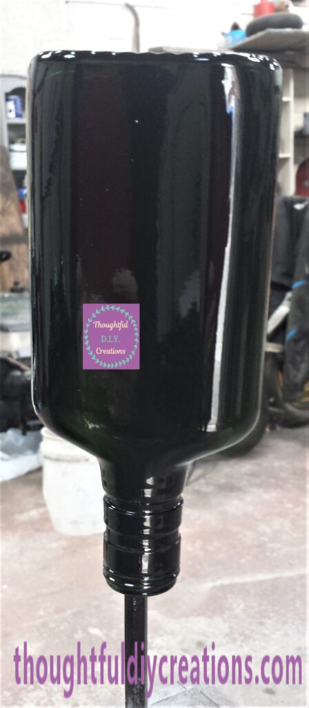 One even layer of Spray Paint on the Bottle.