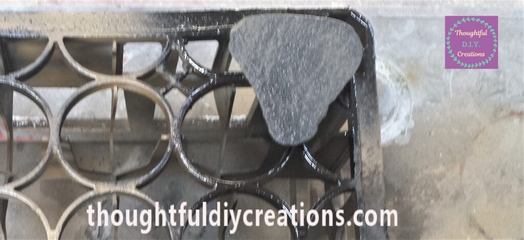 The back of the Stone Spray Painted.