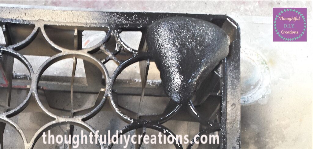 The front and sides of the Stone spray painted.