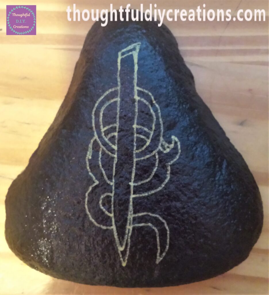 'Lamb Of God' Band's Logo drew onto the Stone with the Gold Paint Pen.