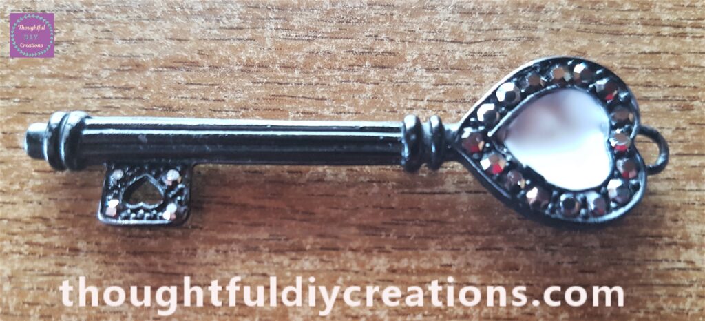 Anita's Tacky Glue in the gap on the key.