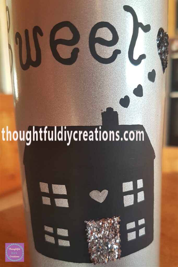 Closer image of the glitter on the bottle.