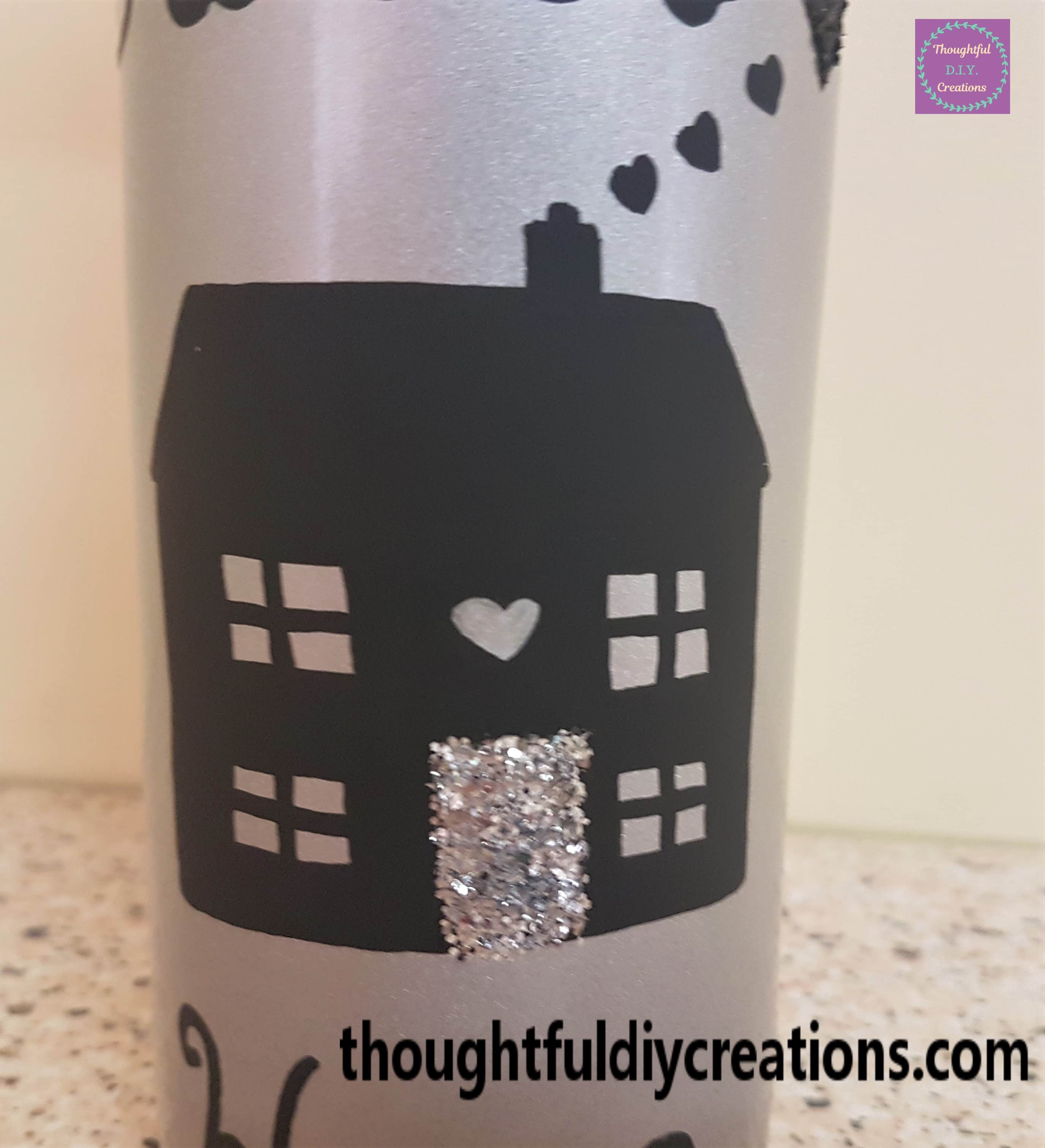 Close up of the house on the bottle.