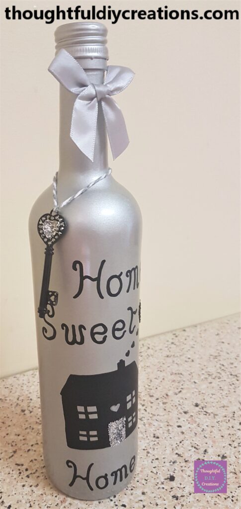 Side of the bottle with the key.