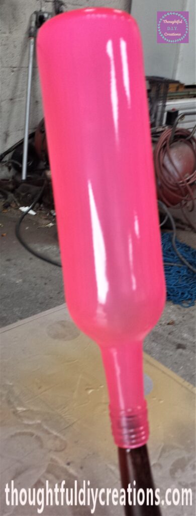 Neon Pink Spray Paint on the Bottle.