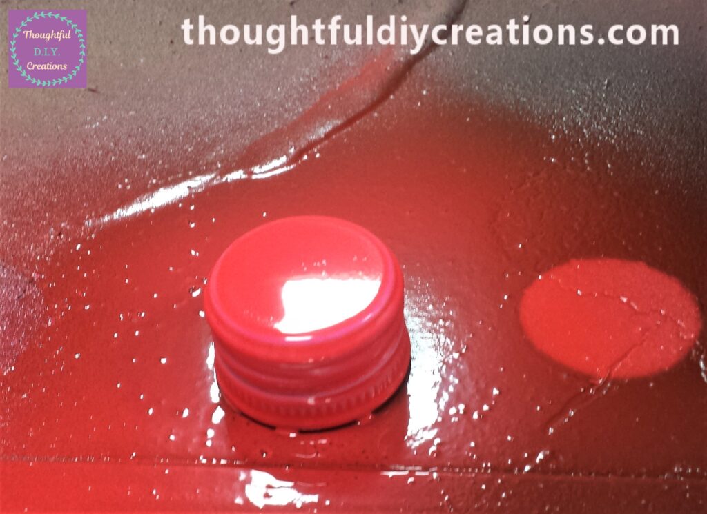 Lid sprayed one final time.