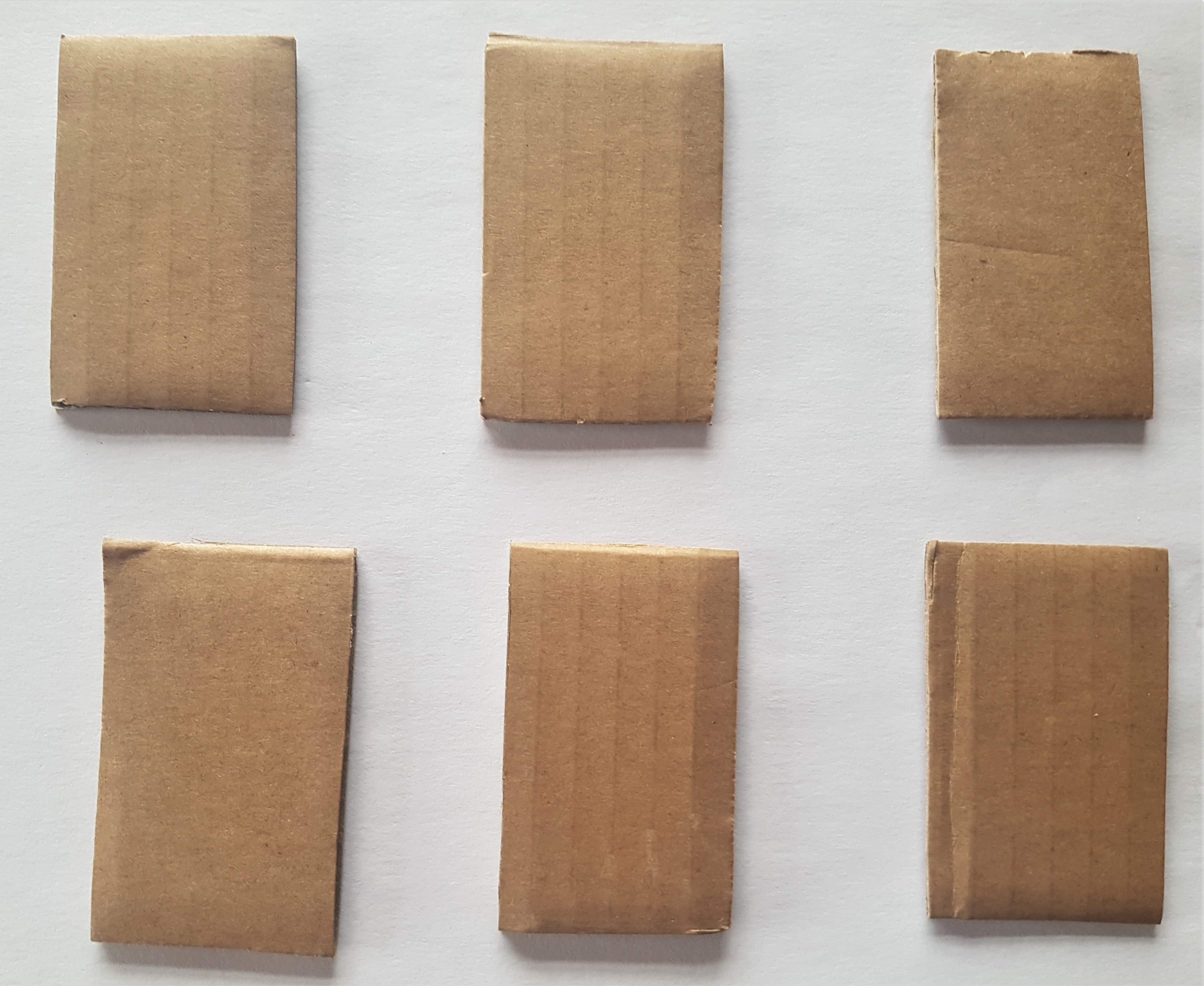 6 Rectangle Shapes cut from the Cardboard from the Laptop Box.