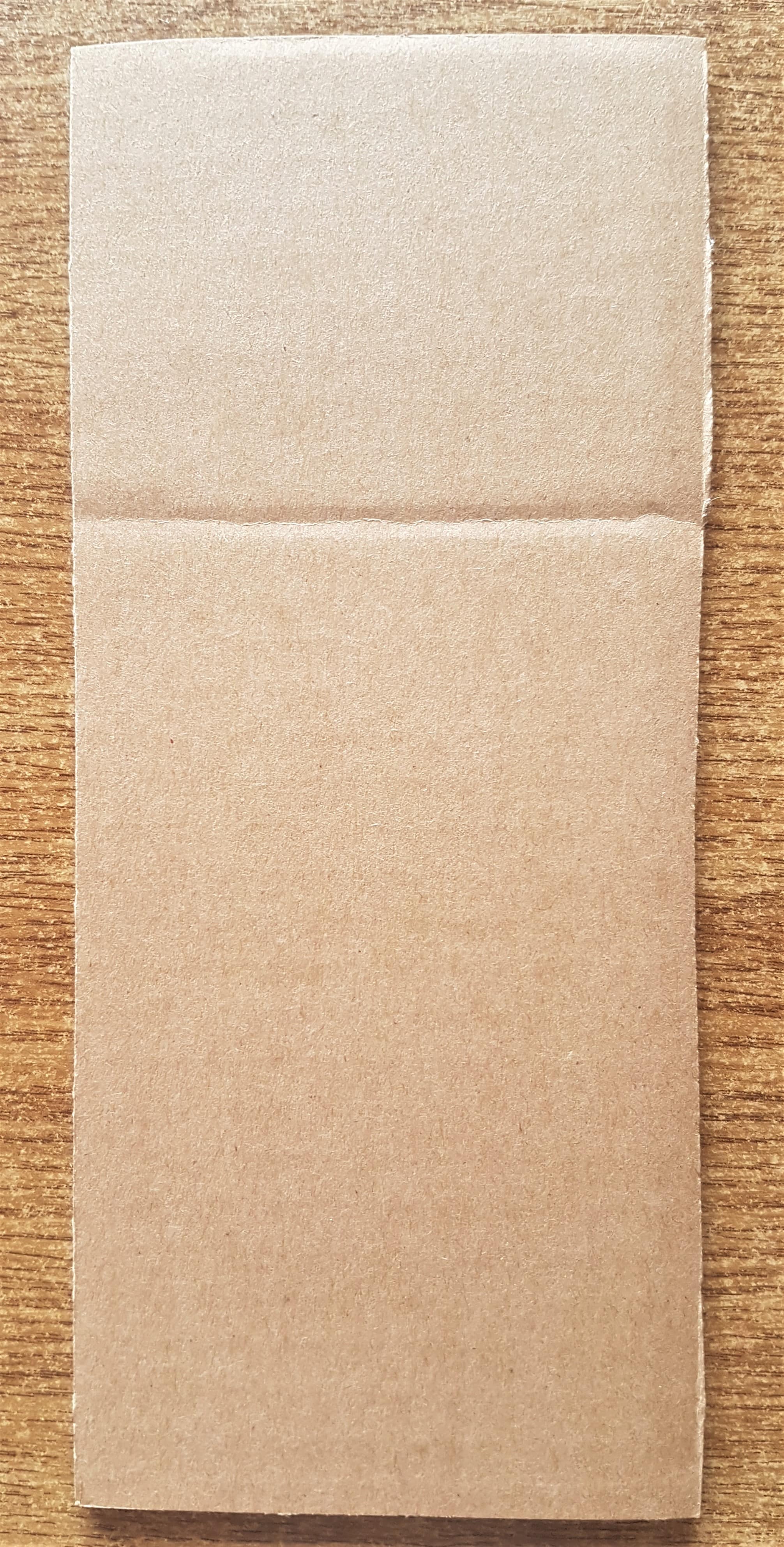 A section of Cardboard cut out from the Laptop Box.