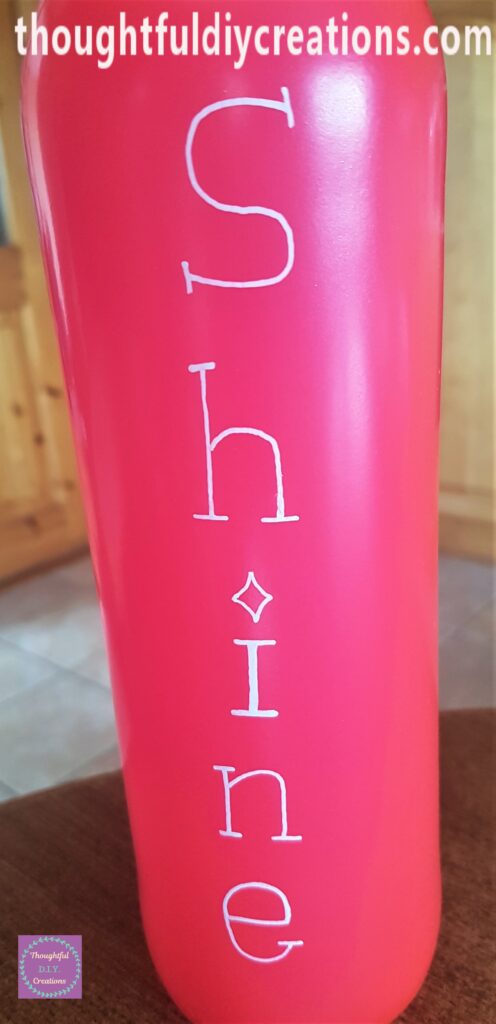 Closer view of the word 'Shine'.