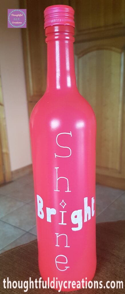 The letters of the word 'Bright' filled in with the white paint pen.