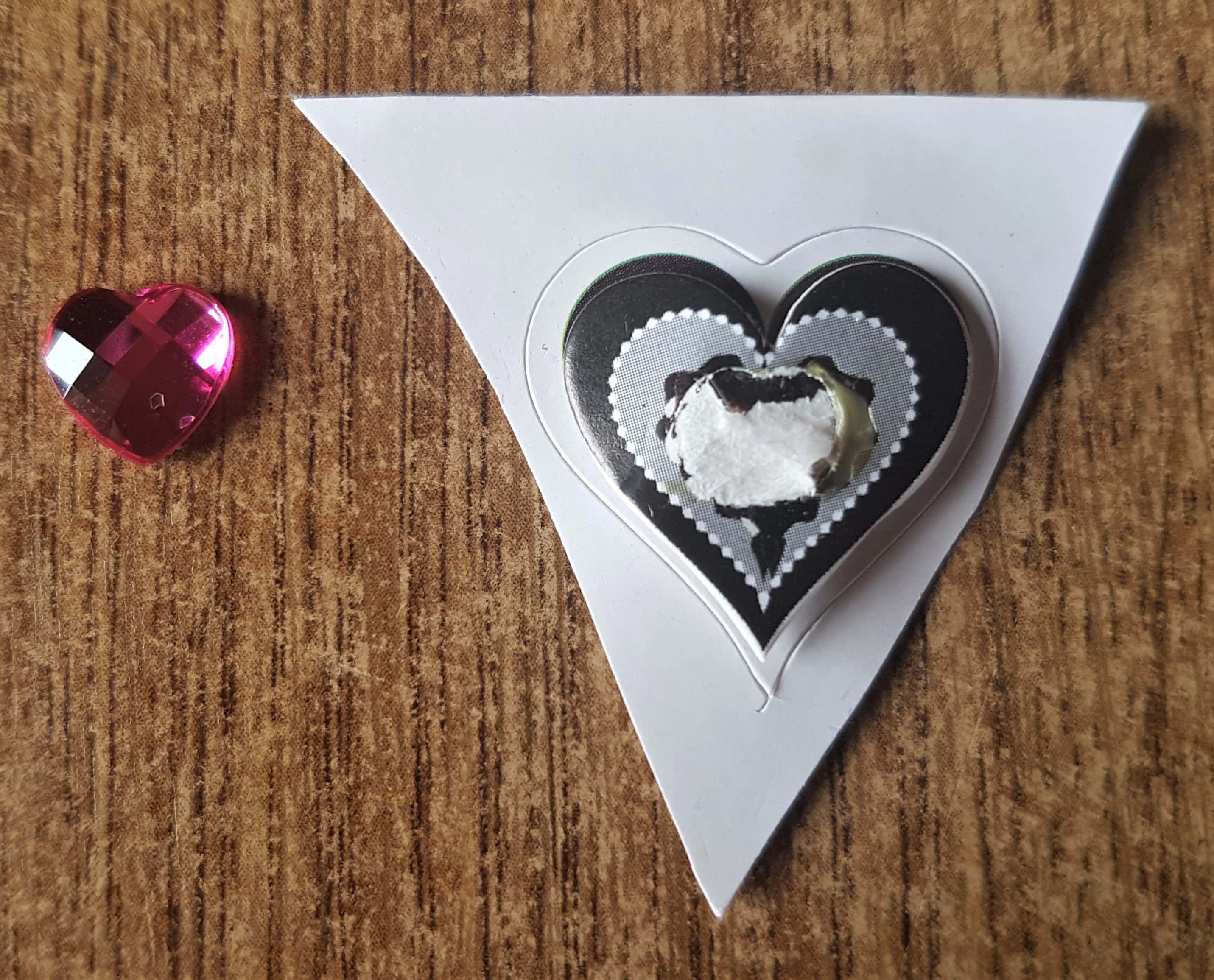 Pink love heart diamond removed from the sticker.
