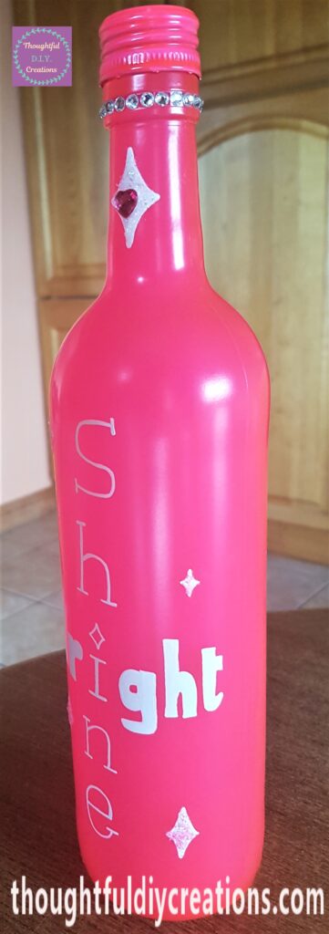 Other side of the Pink Spray Painted Bottle.