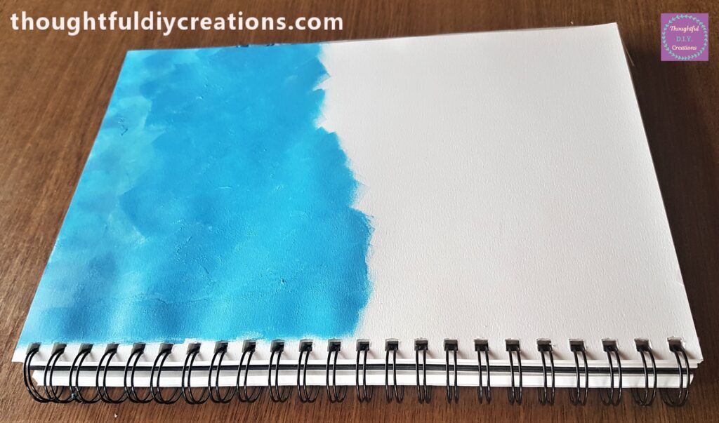 I dabbed the Paint mixture onto the Art journal page with the make-up sponge.