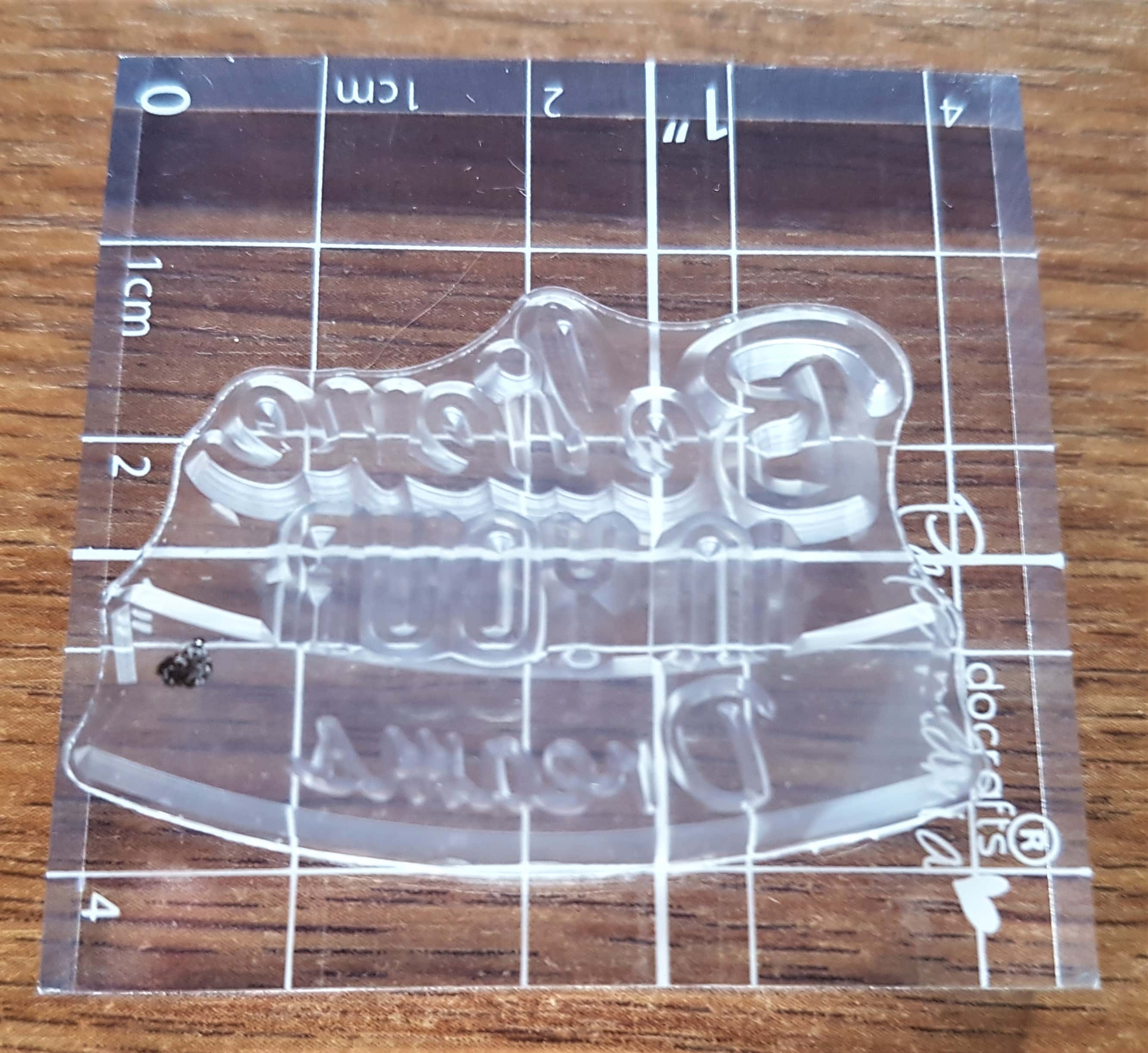 'Believe in your Dreams' stamp put flat side down on the acrylic block to keep it in place.