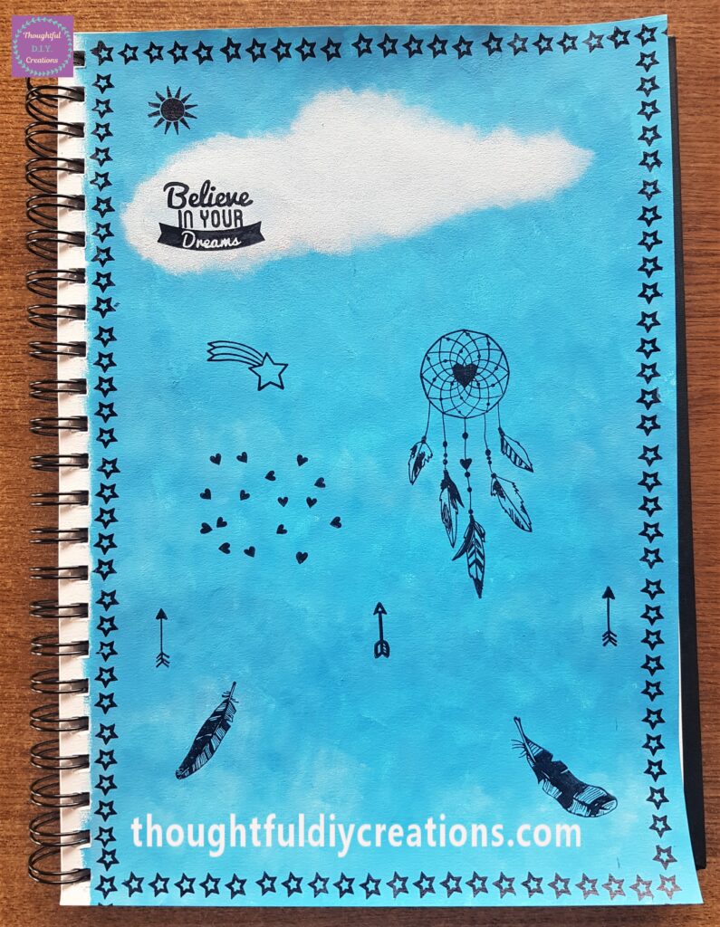 First arrow stamp added again to the right hand side of the page. A bigger Feather Stamp added to the Page.