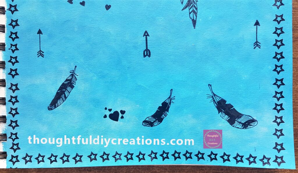 Small Love Heart Cluster Stamp added between the first two feathers.