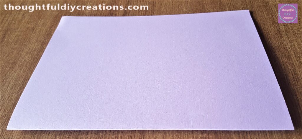 I folded the Card in half and pressed down along the fold.