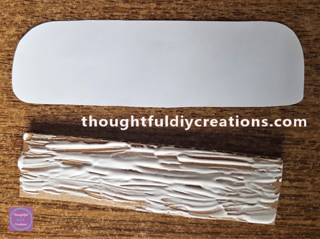 'Anita's Tacky PVA Glue' on the Cardboard and spread it out using a paintbrush.