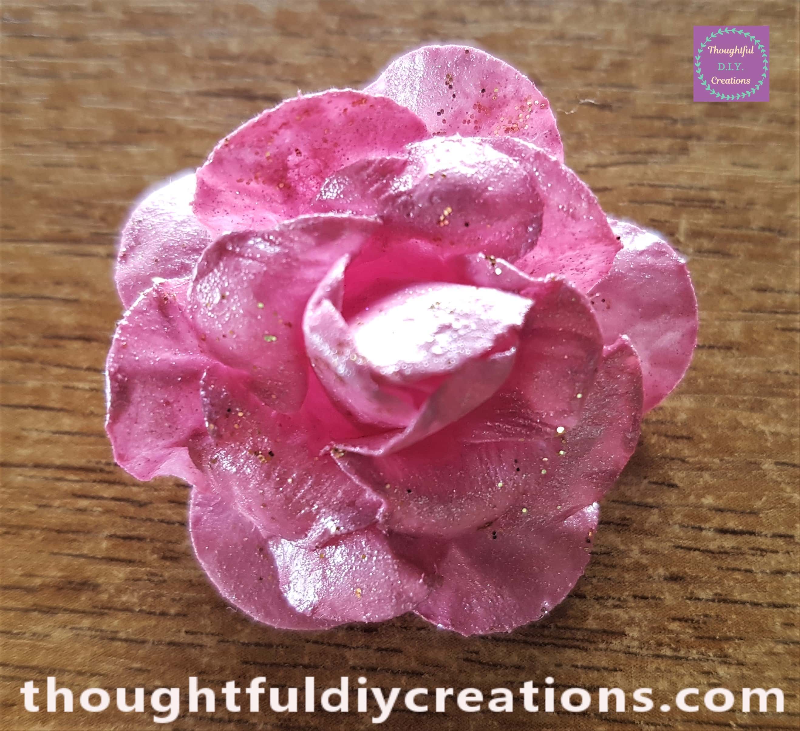 Pink Nail Varnish applied all over the Pink Flower. The Gold Glitter Eyeliner applied to parts of the flower.