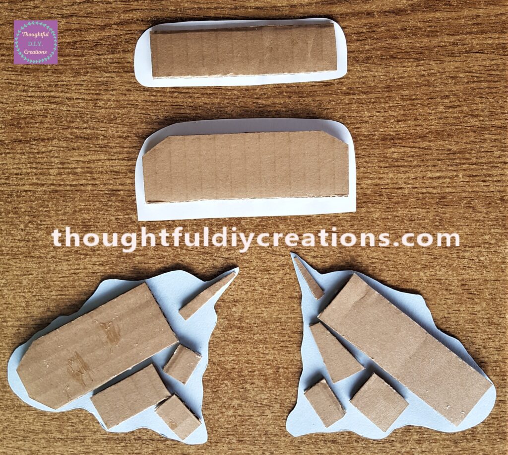 All the Cardboard Pieces glued and attached to the back of the Unicorn Pictures and Quote.