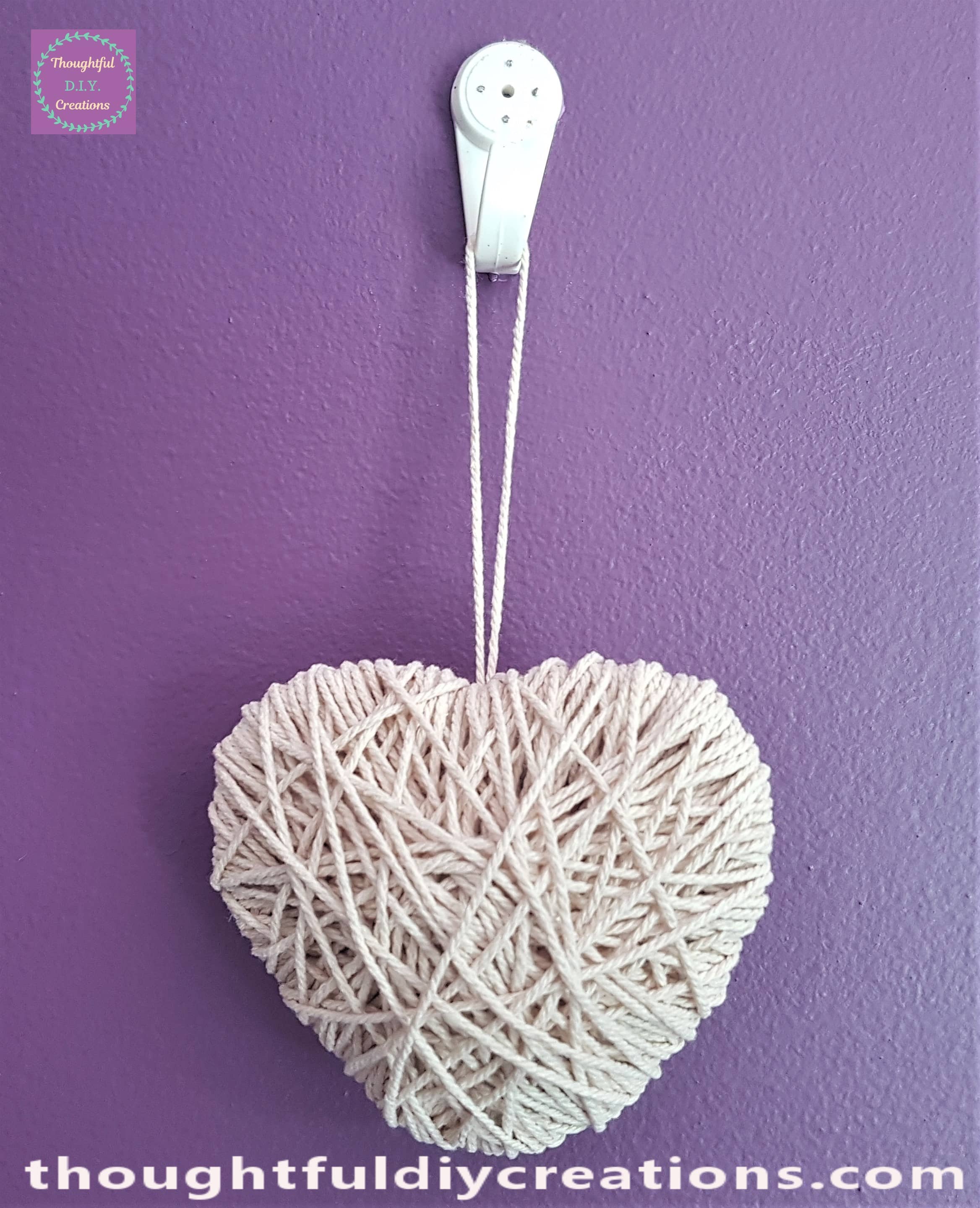 Cream Heart hanging up on the Wall.