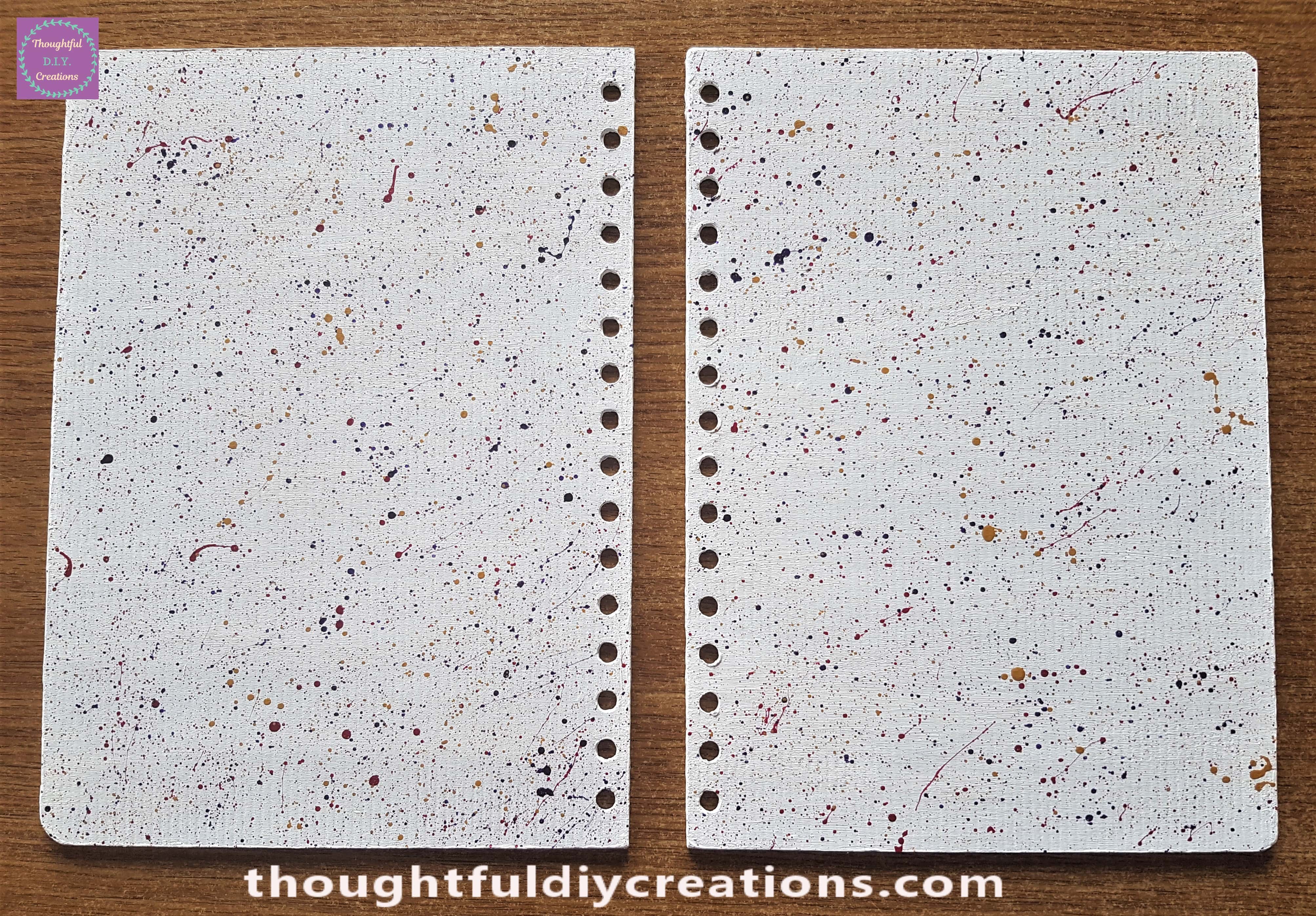 Splattered Paint over the Journal Covers filling any gaps and completing the inside journal.