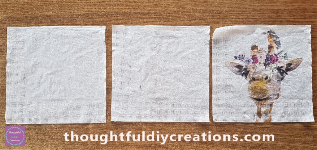 I removed the 2 layers from the 3-ply napkin by finding the corner of the layer and pulling it back.