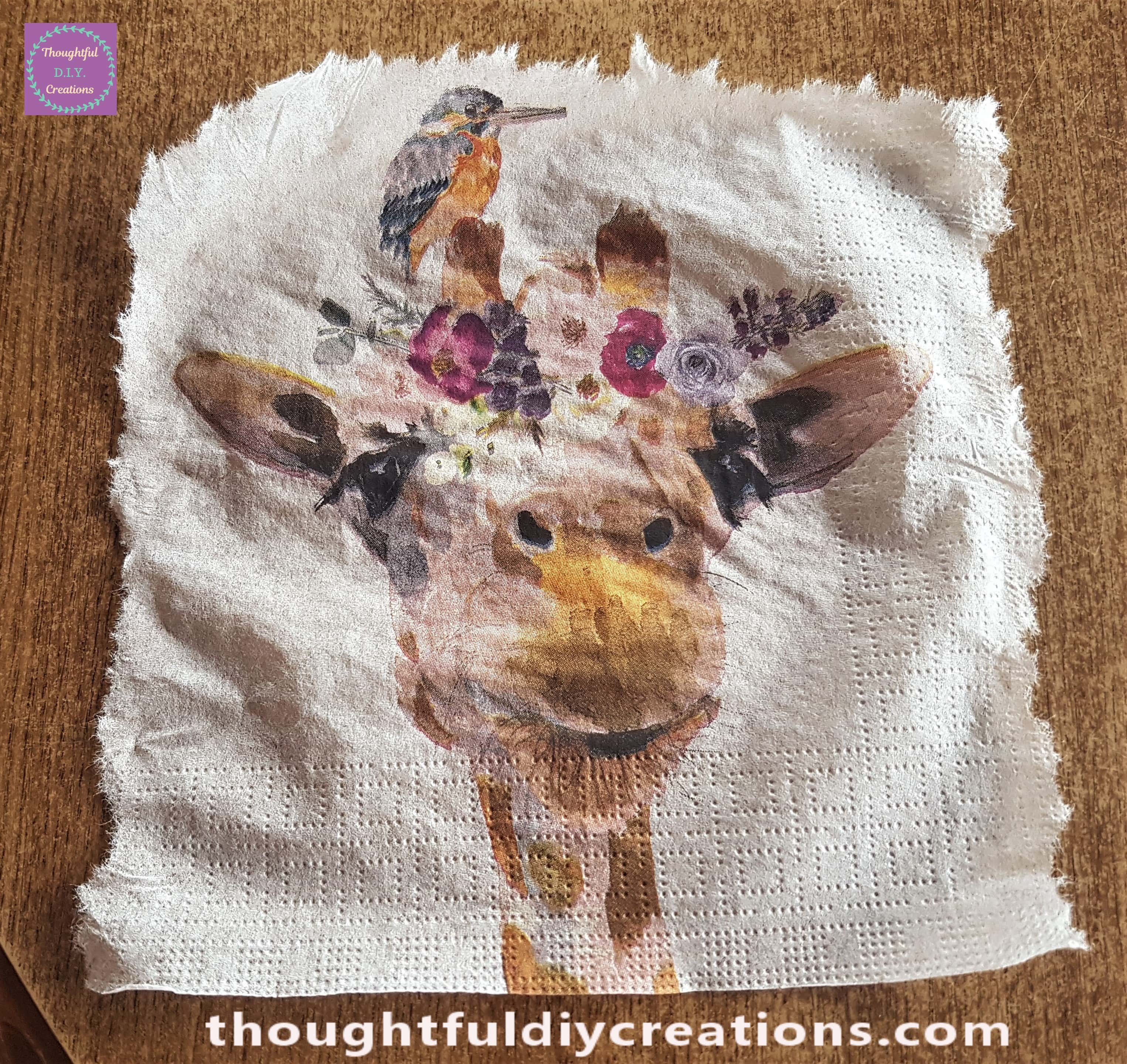 I tore around the Giraffe print to make it easier to blend into the background.