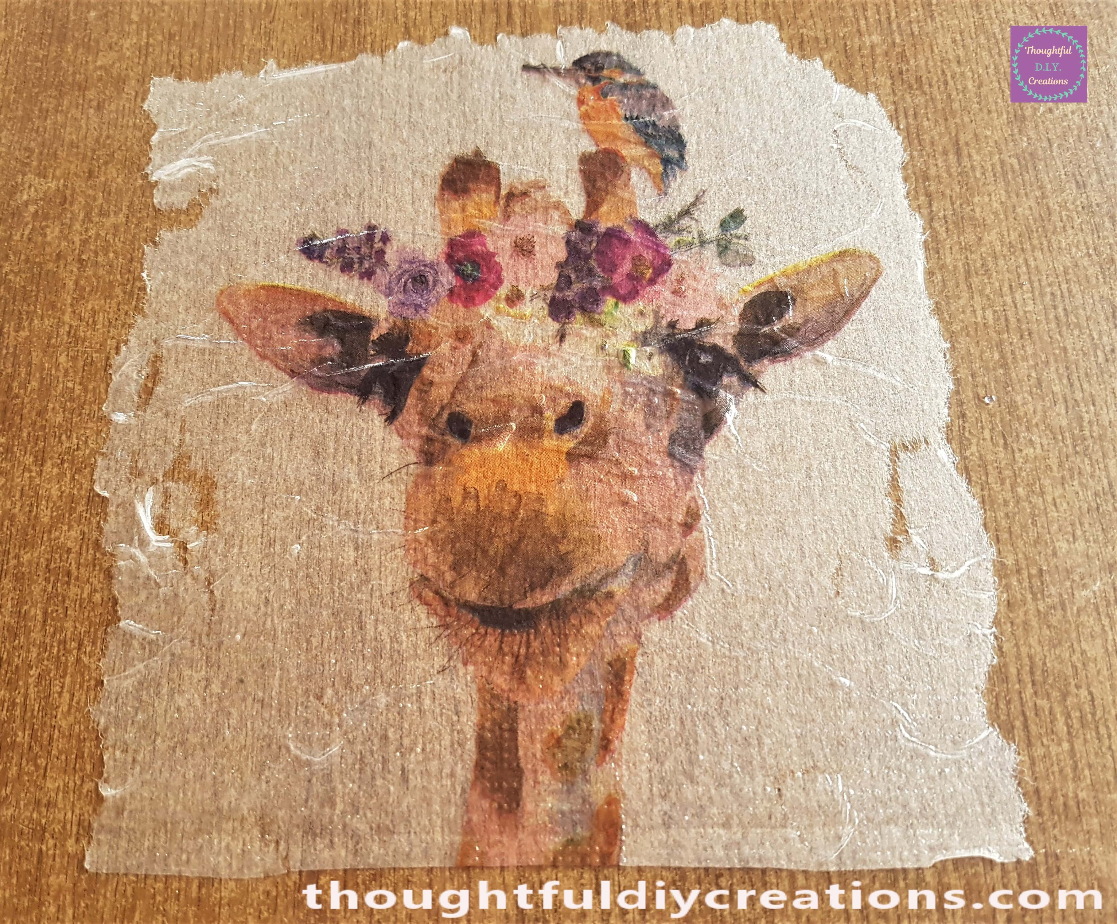 Stretch the corners of the Napkin back to remove some wrinkles from the Decoupage Napkin.