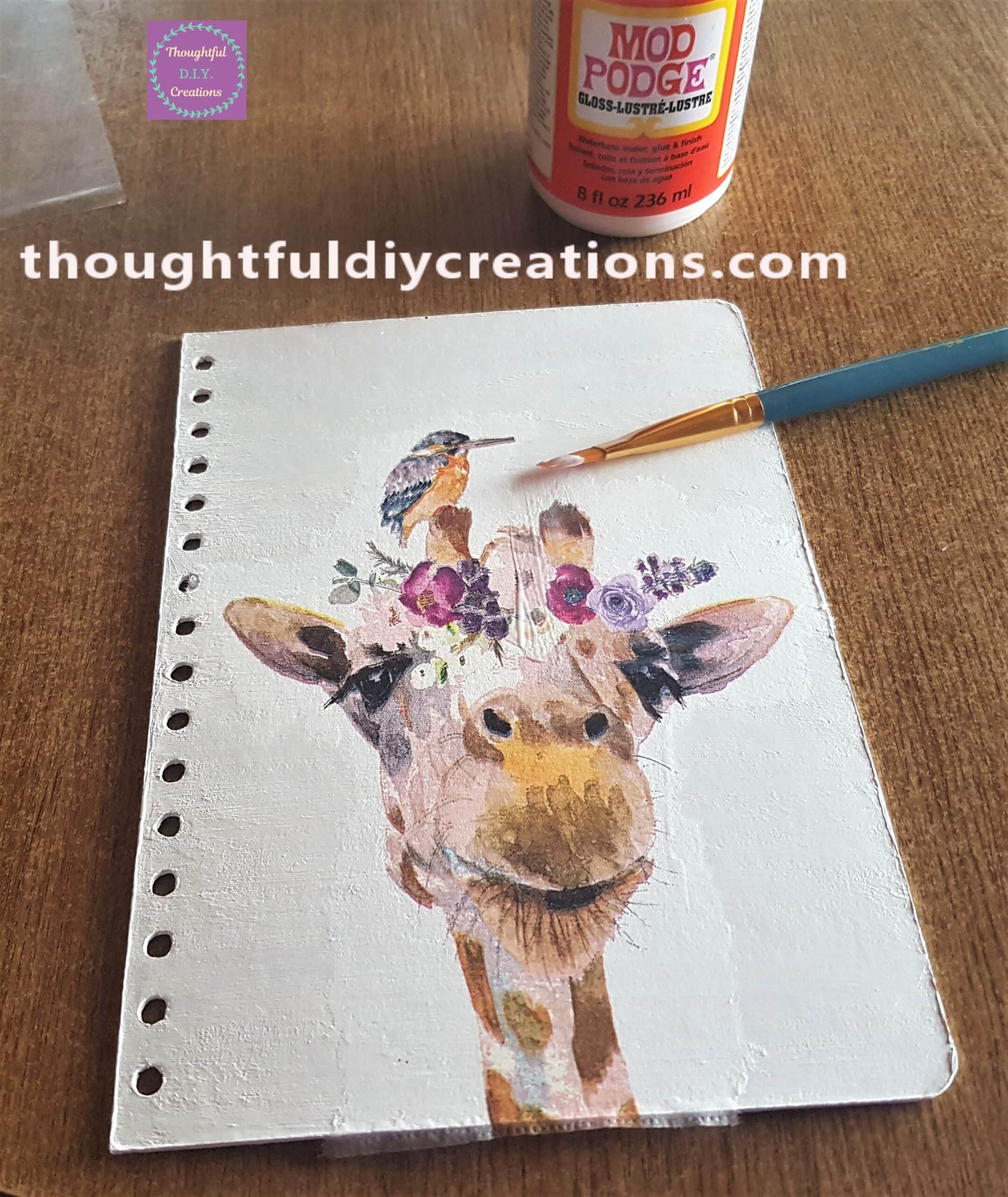 Mod Podge Gloss carefully added a layer all over the Napkin starting from the center and brushing outwards.