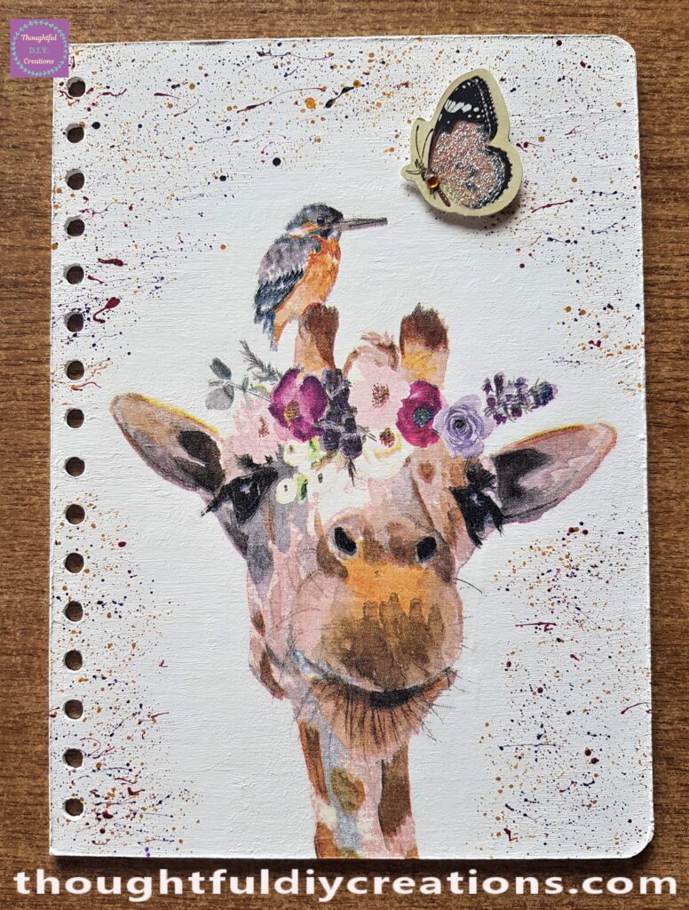 To the Front Cover I added a Dimensional Butterfly Sticker, it complemented the Giraffe.