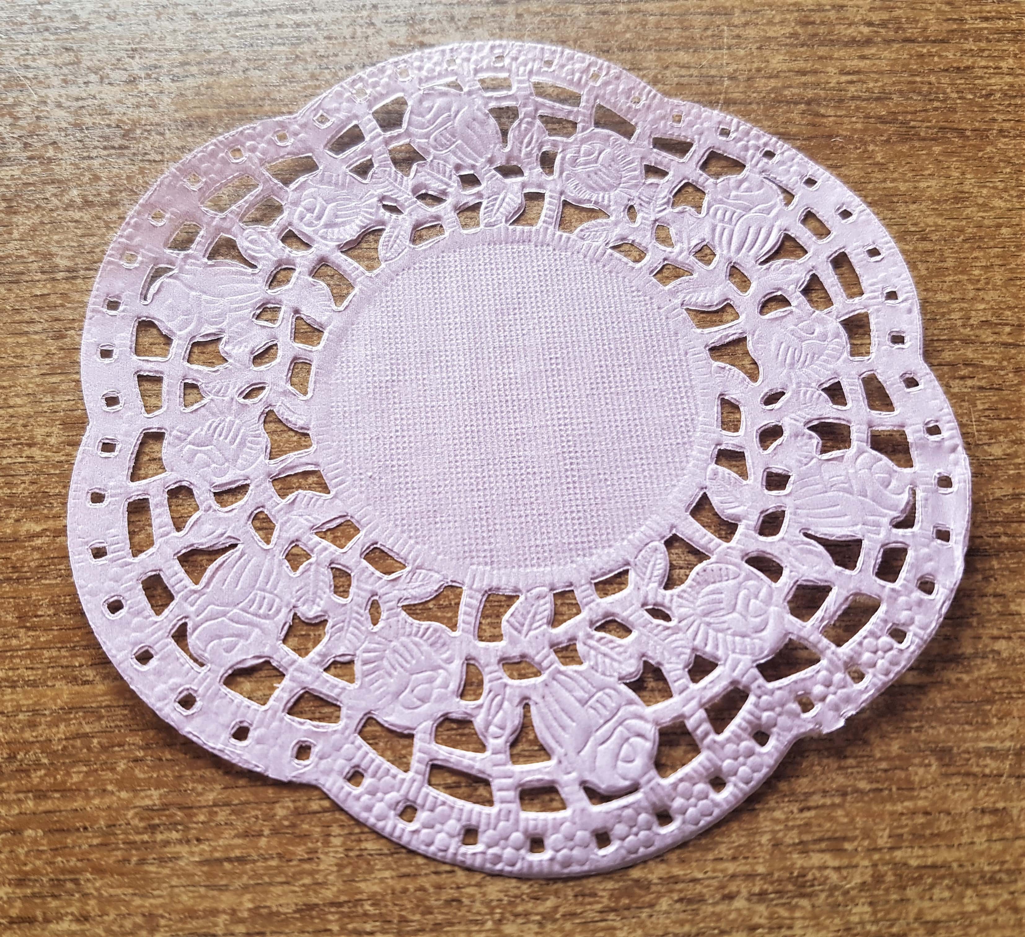Pink rose print Paper Doily for the Scrapbook Layout.