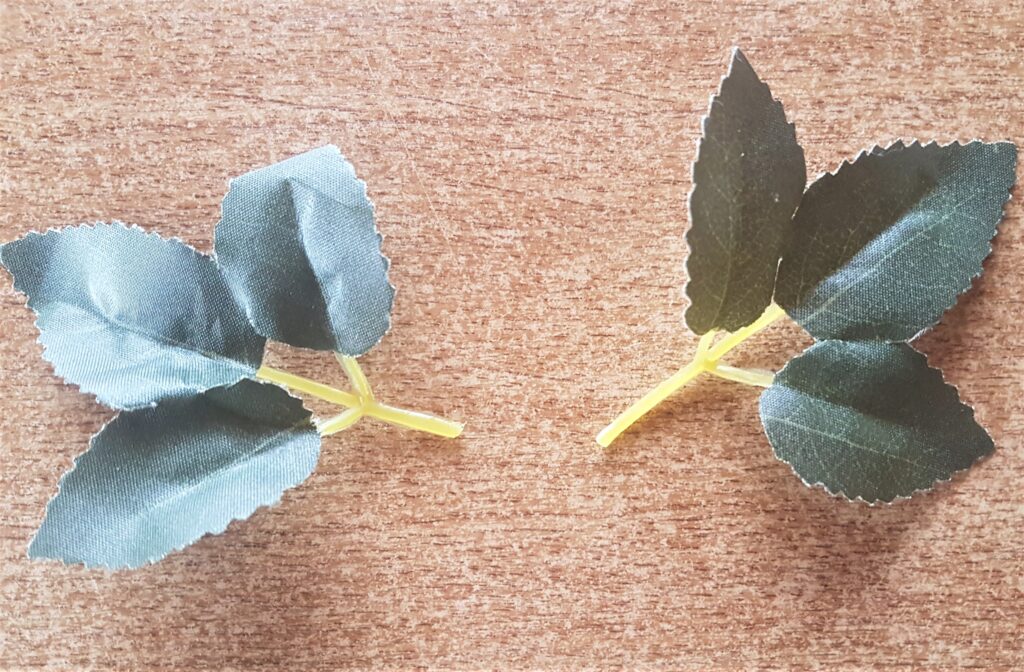 Cut off two sets of leaves from an Artificial Bunch of Flowers.