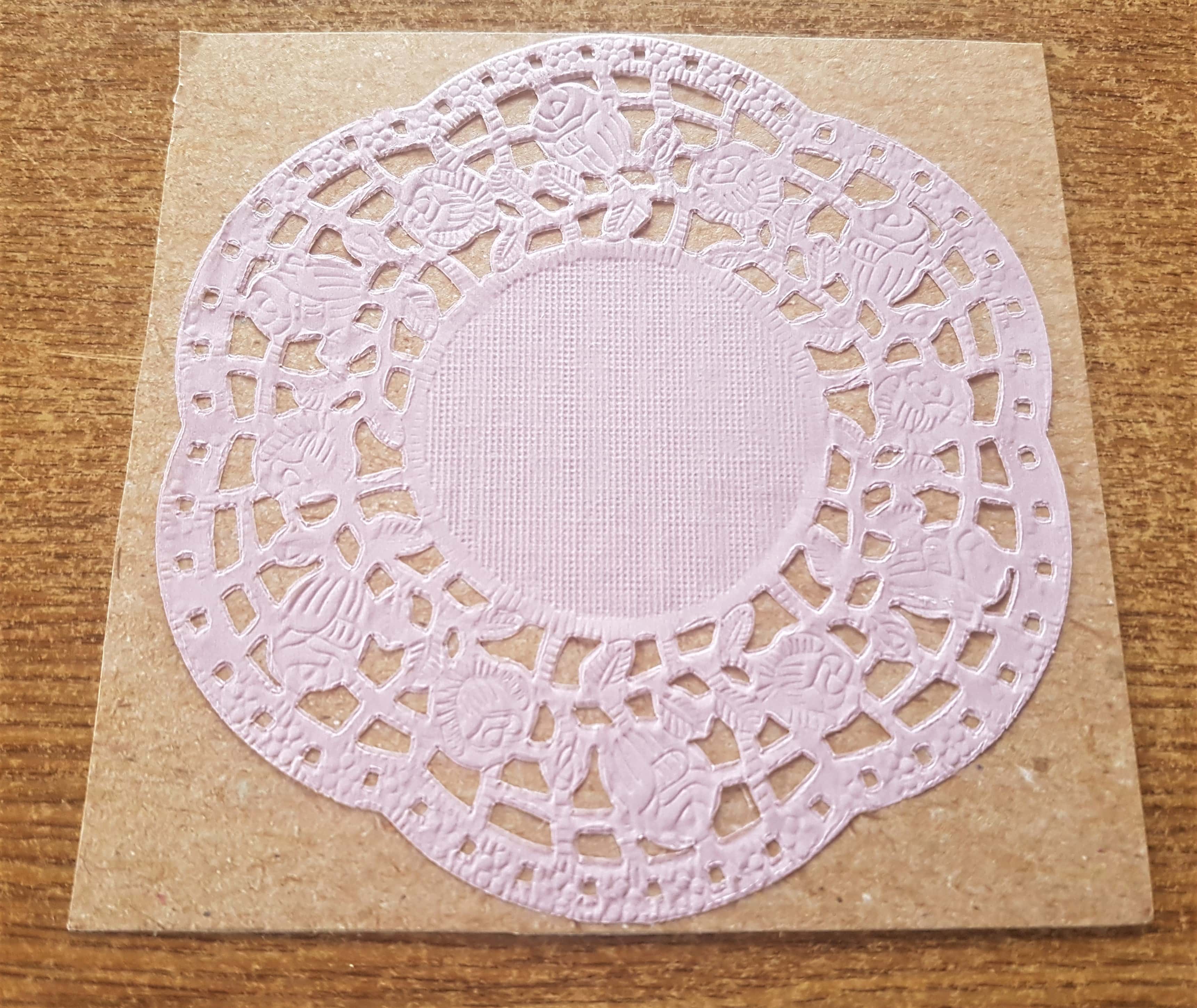 Attached the doily to brown textured cardstock using Pritt Stick.