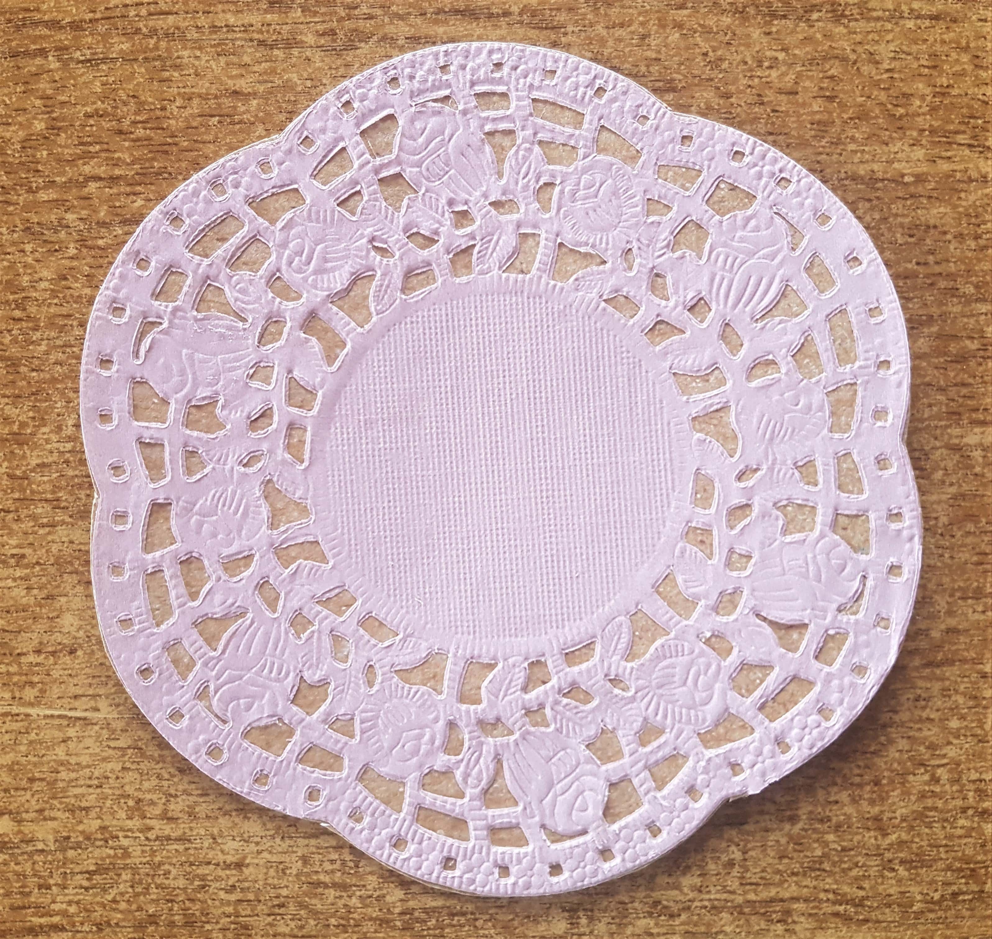 Cut around the doily to remove the excess brown cardstock.