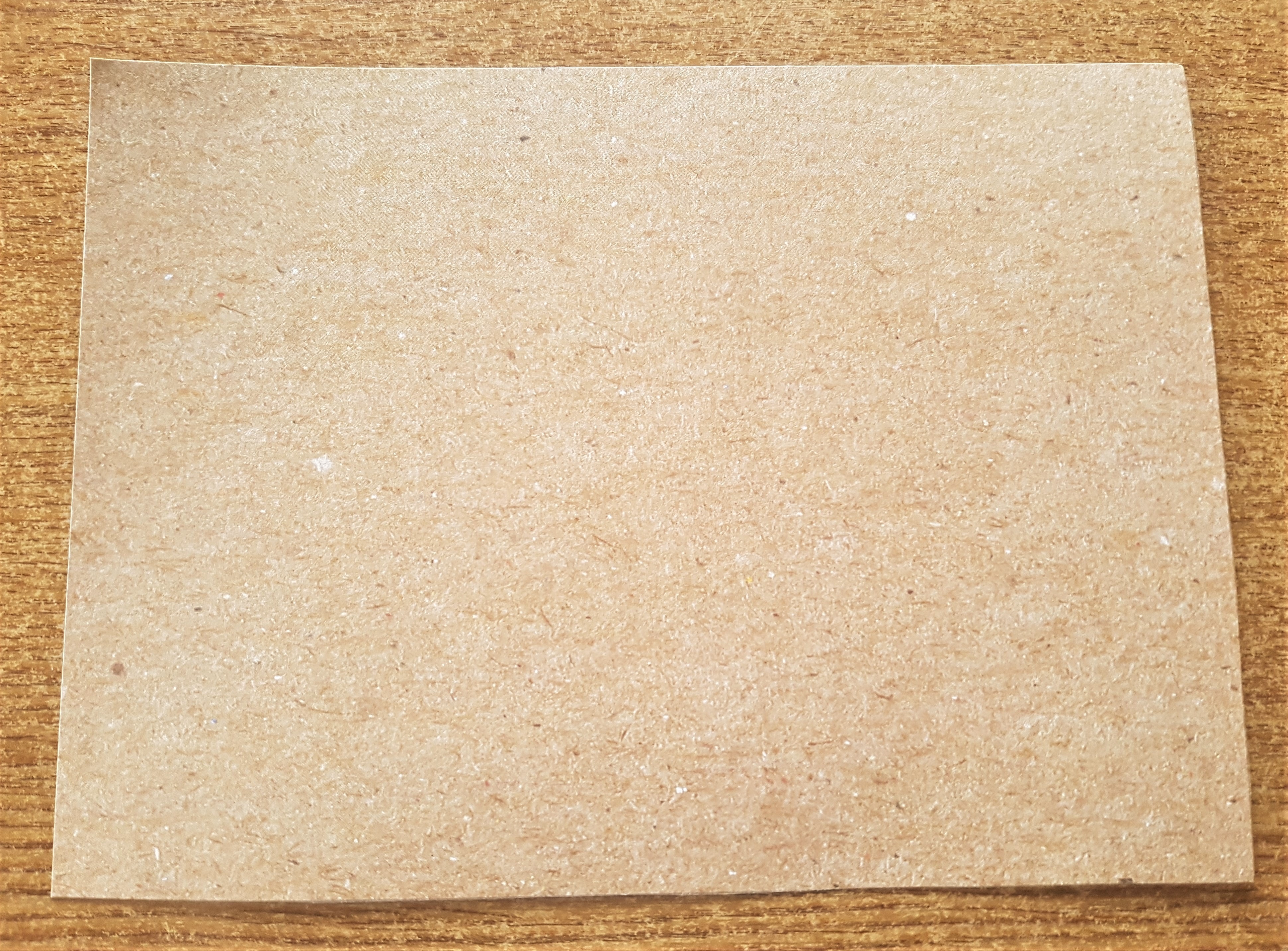 Cut out a section of the Brown Paper for a border for the fairy image.