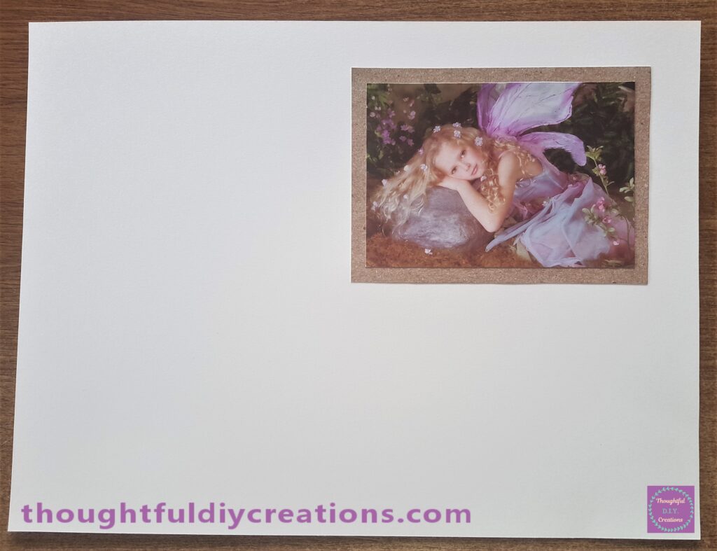 Glued the Fairy Image to the top right hand side of the Scrapbook Layout.