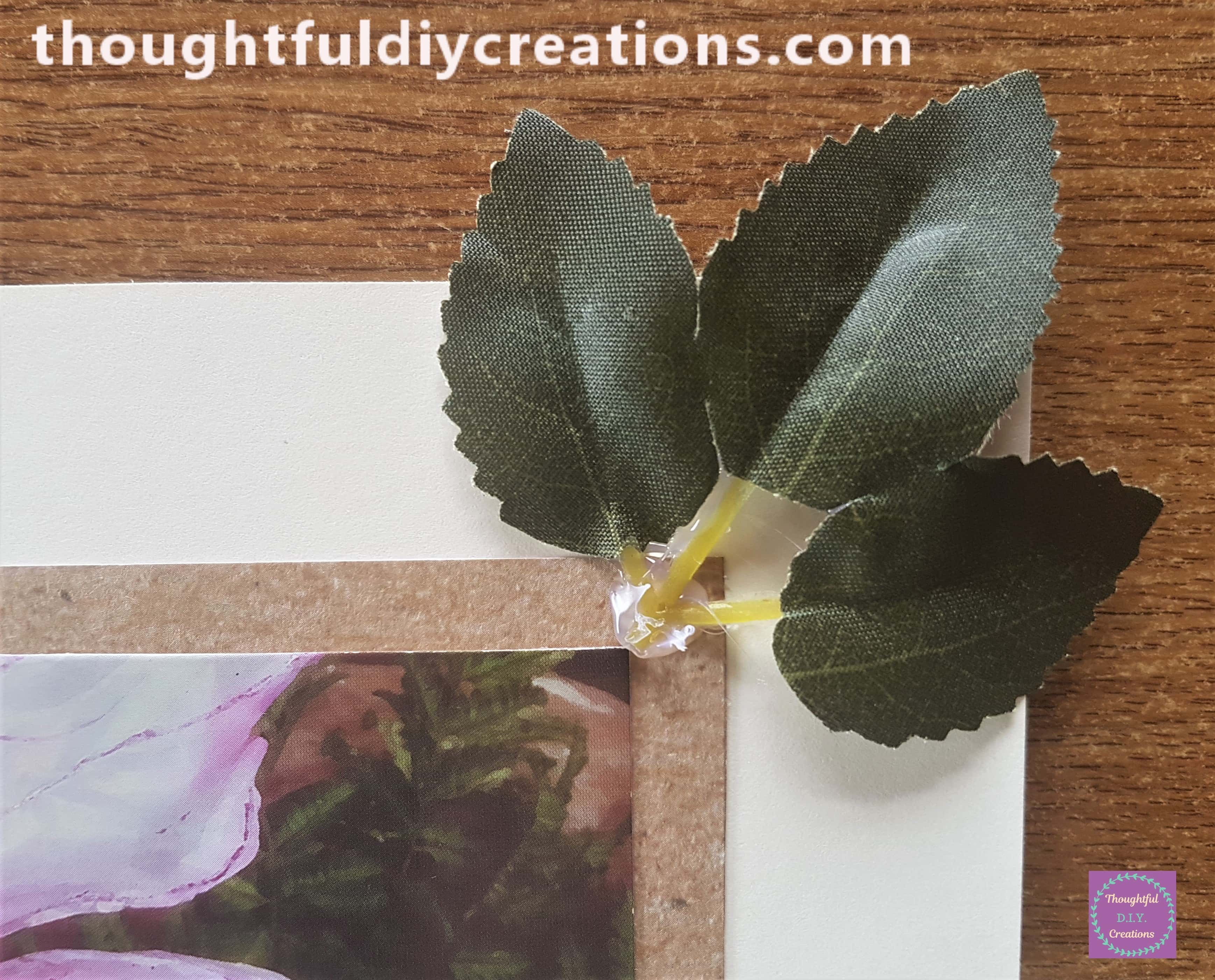 Clear Hot Glue on the Stem of the leaves and attached to the top right hand corner of the Border Fairy Image.