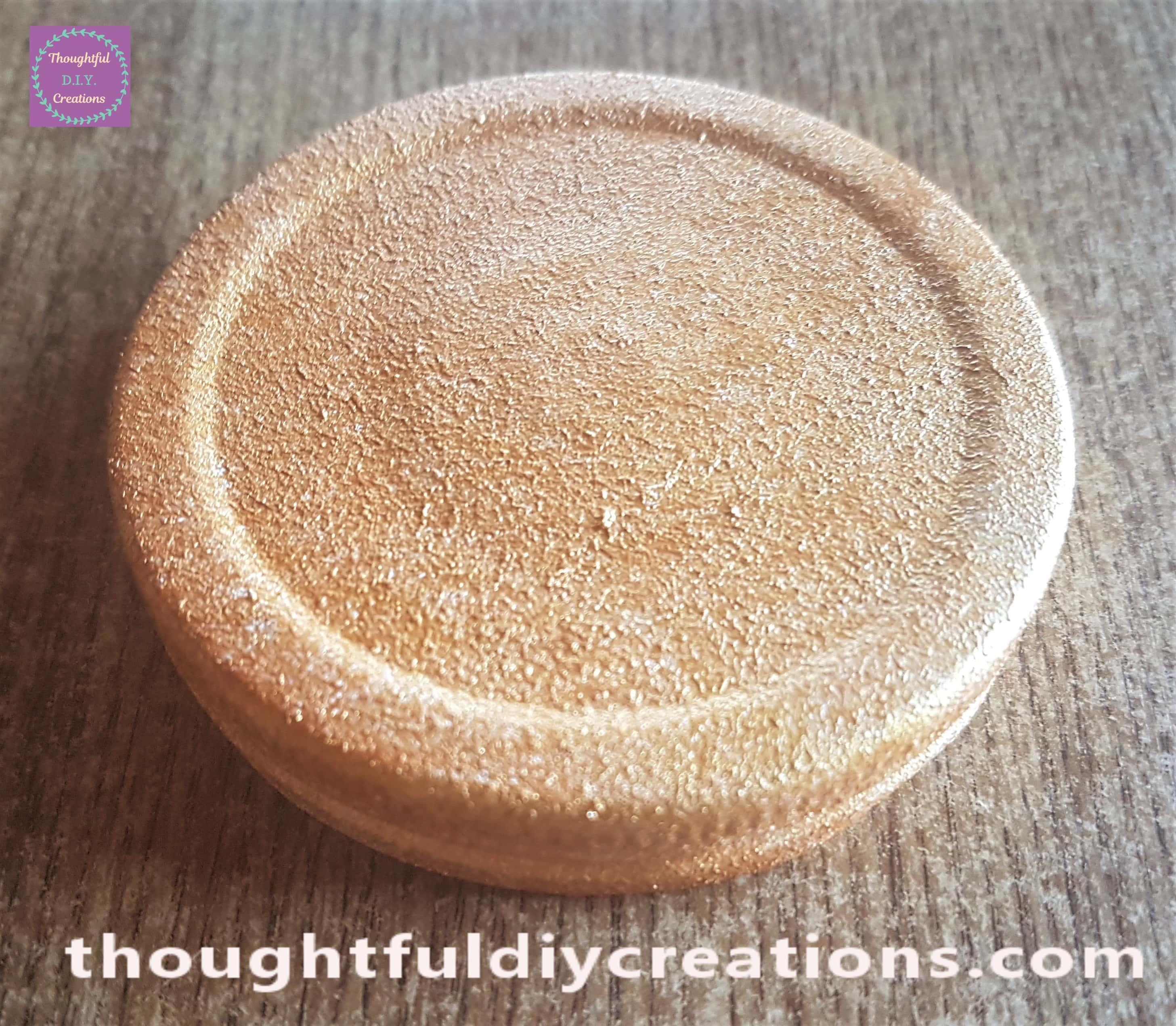 Paint on the plate, sponge dipped into paint and dabbed onto the lid until it was covered.