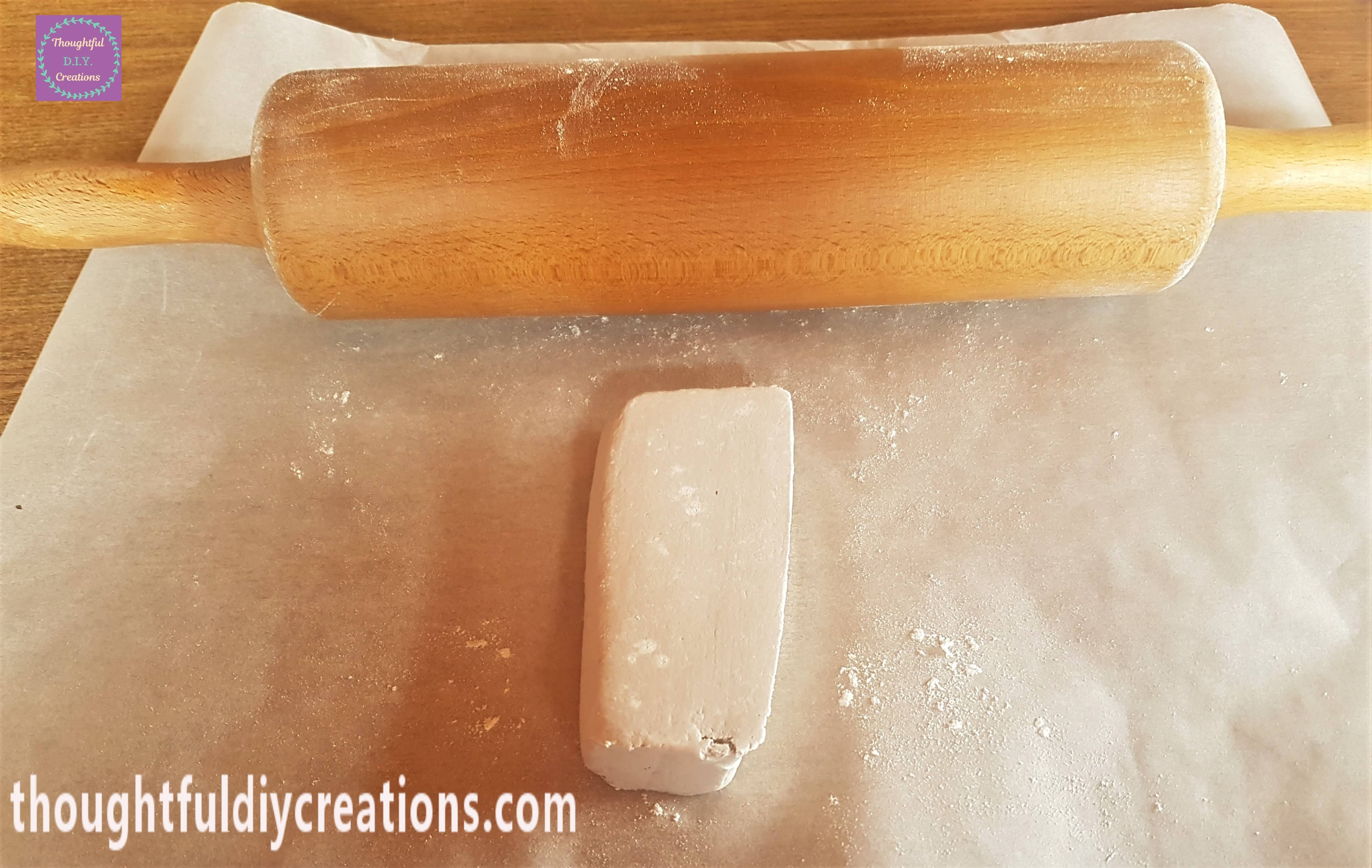 I started to Roll the Clay up and down with the Rolling Pin.