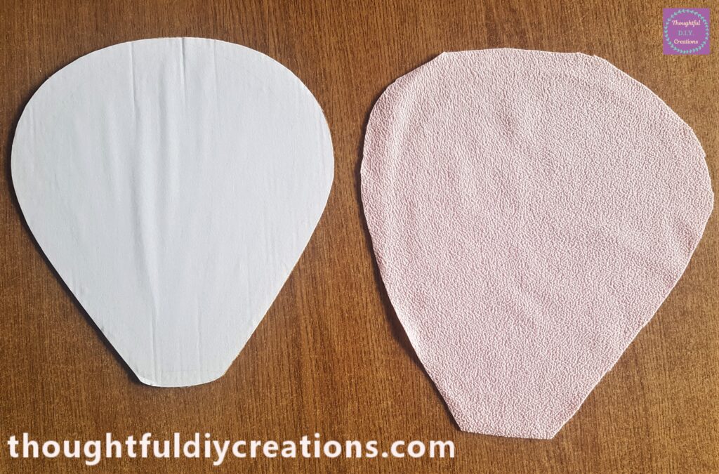 Cardboard Hot Air Balloon on the fleece and cut around it leaving a 1cm border all around.