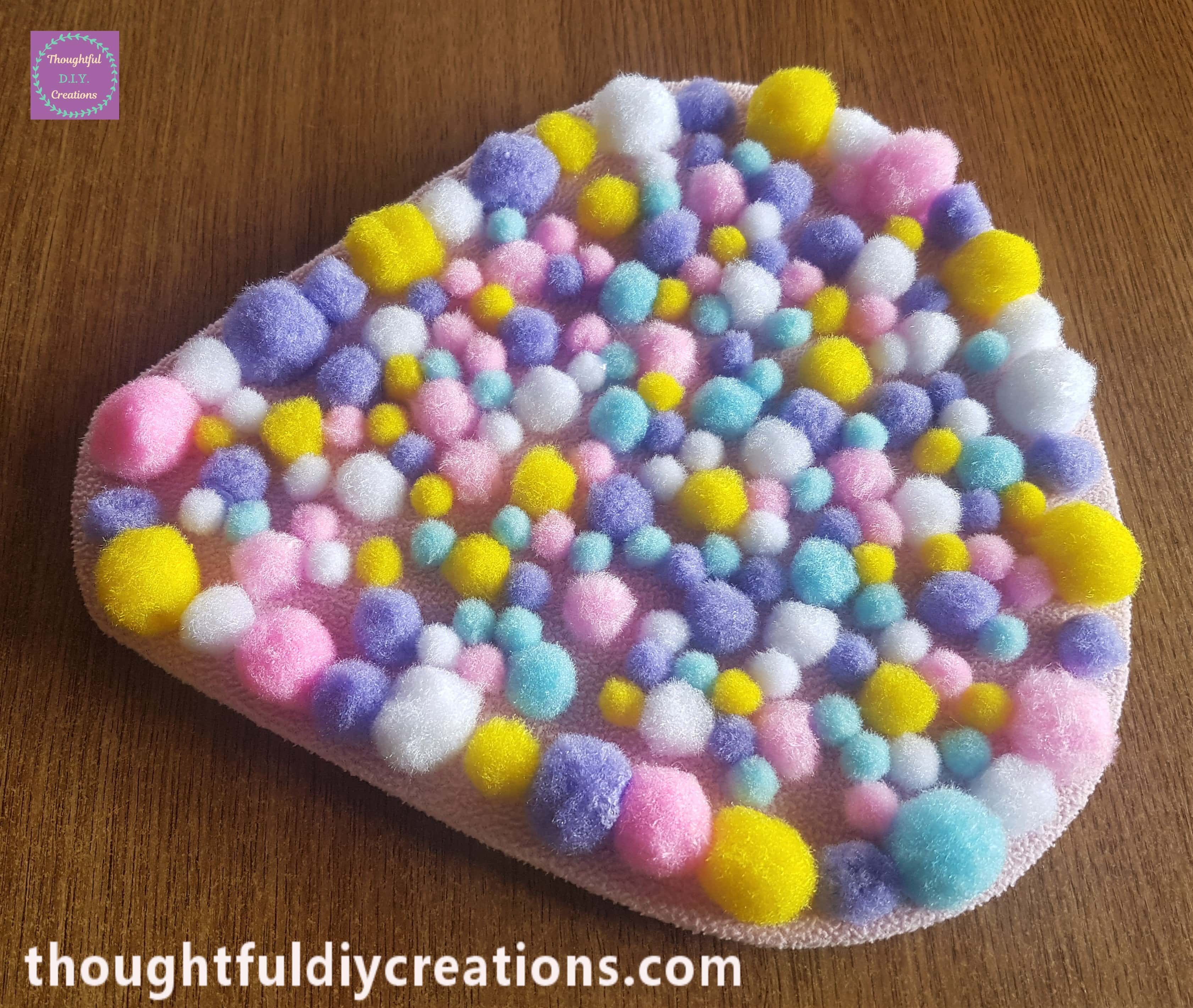 Side angle of the Hot Air Balloon filled with Pom poms.