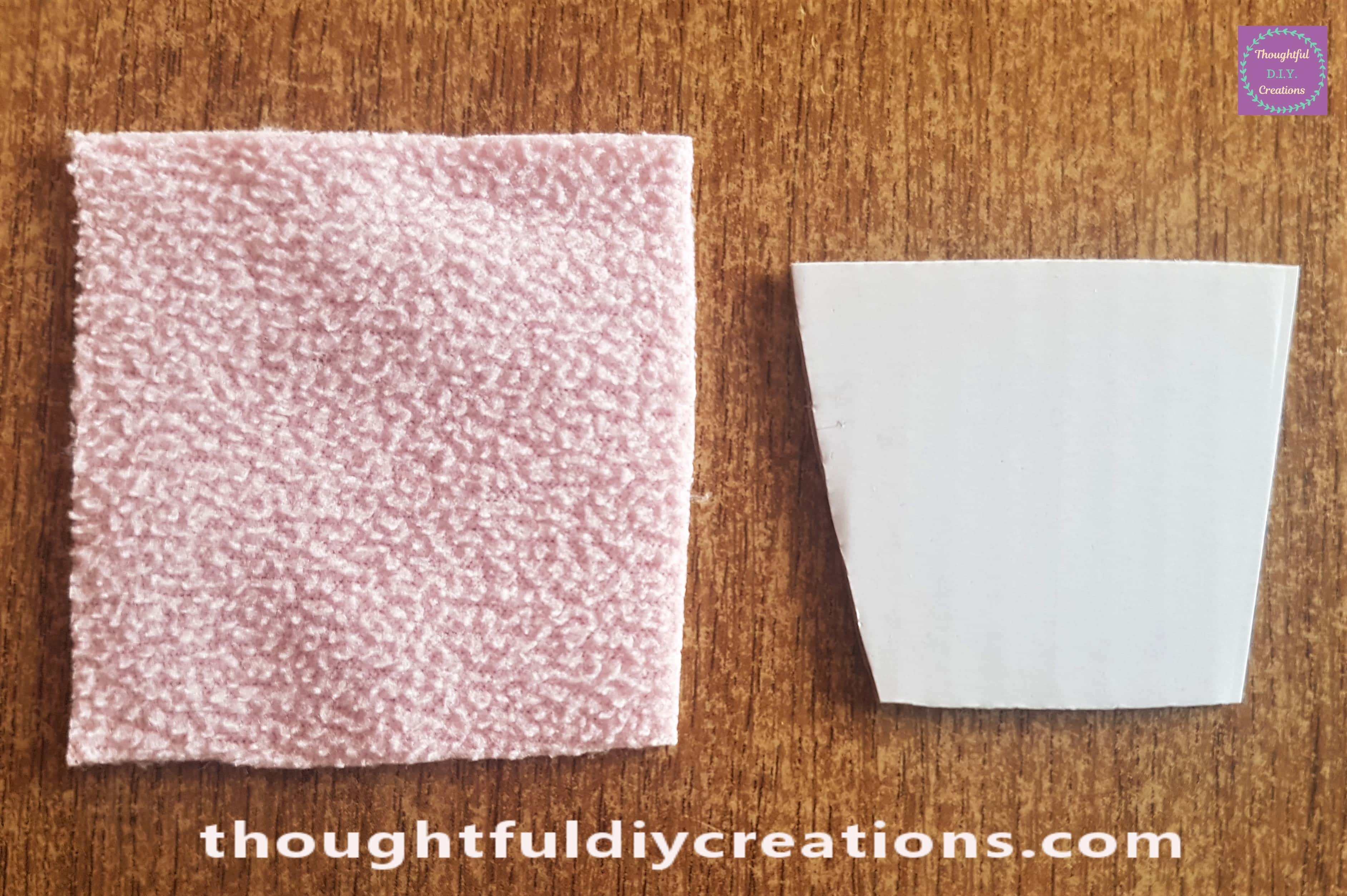 I cut out some Pink fleece bigger than the Cardboard Basket I made earlier.