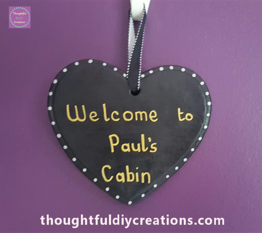 Clay Heart hanging up on the Wall.