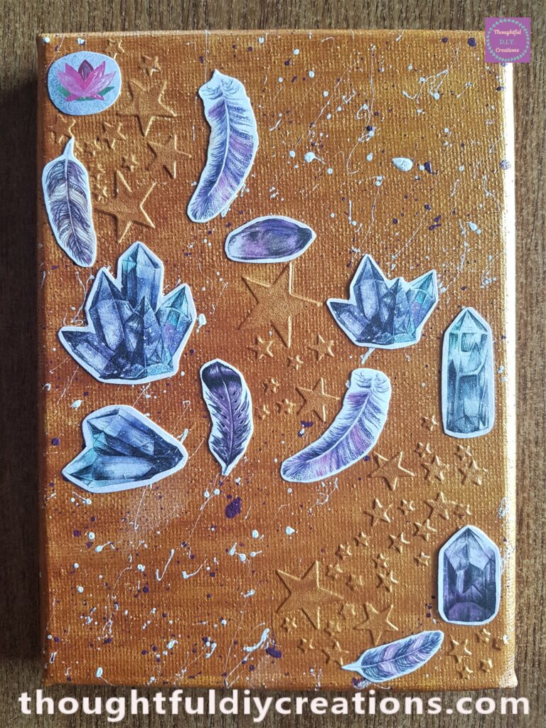 I attached the Lotus Flower, Crystals and the Feathers to the Canvas using PVA Glue.