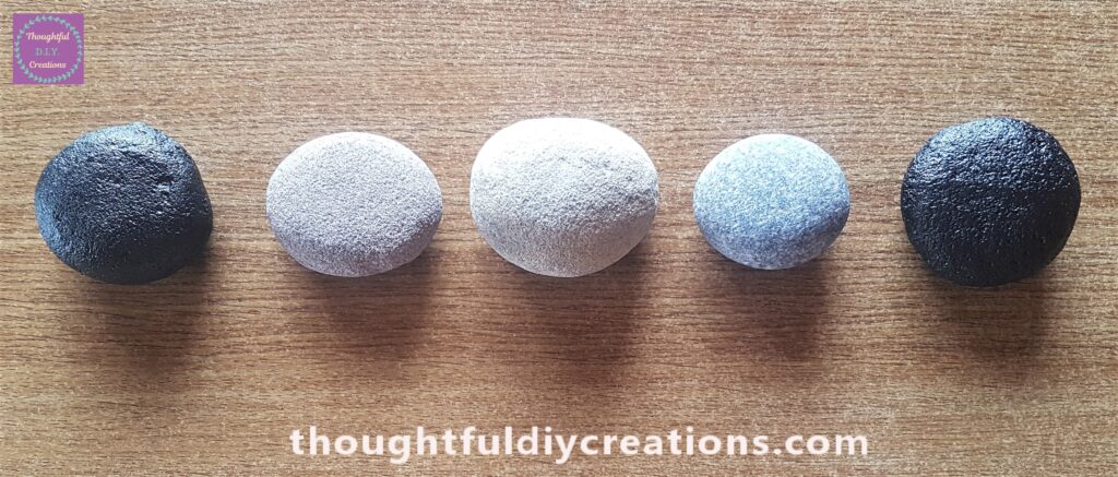 Photo of all the stones the next day after they were painted and dry.