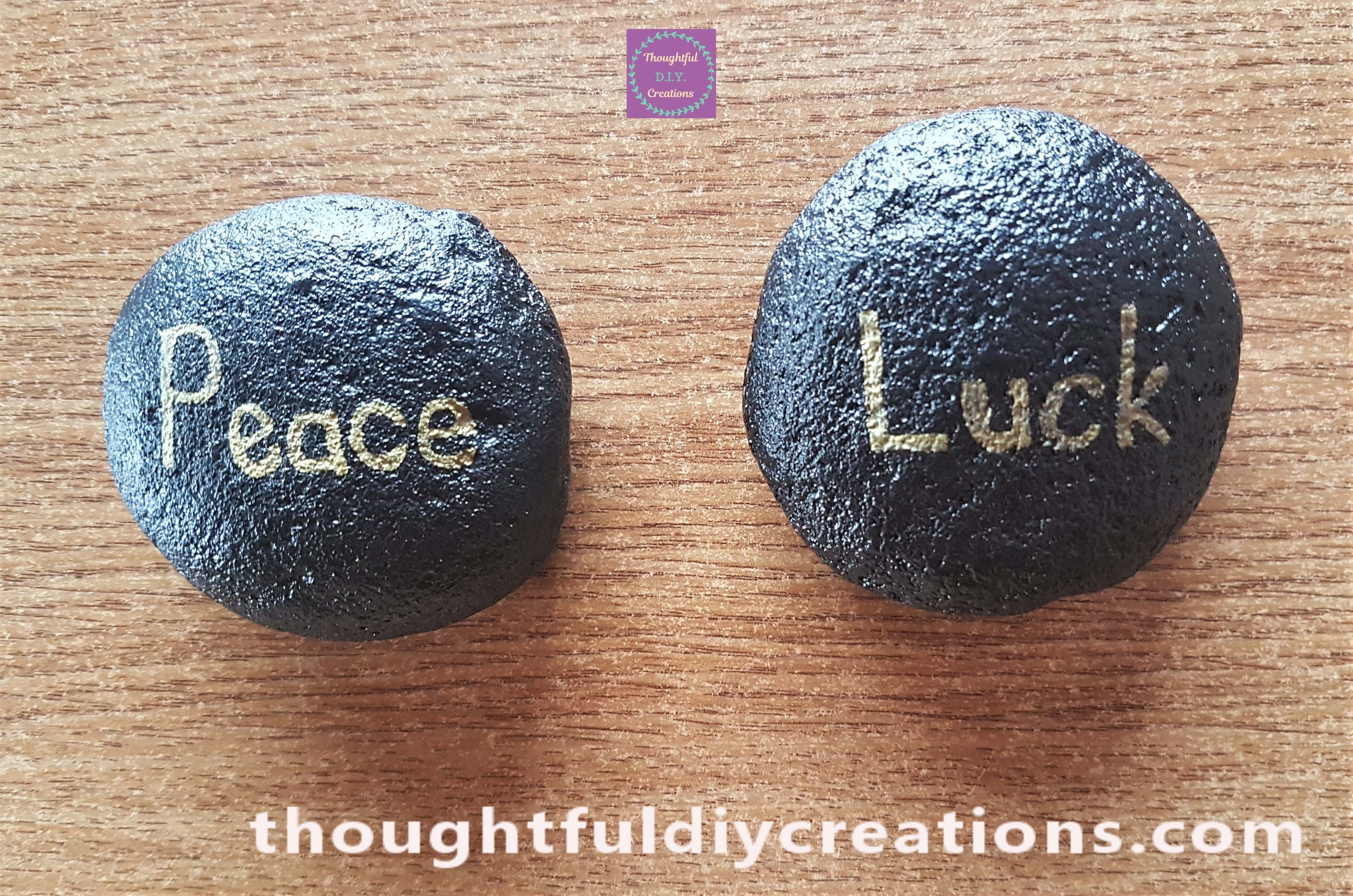 I applied a second layer to the Painted Home Decor Stones with the Gold Paint Pen.