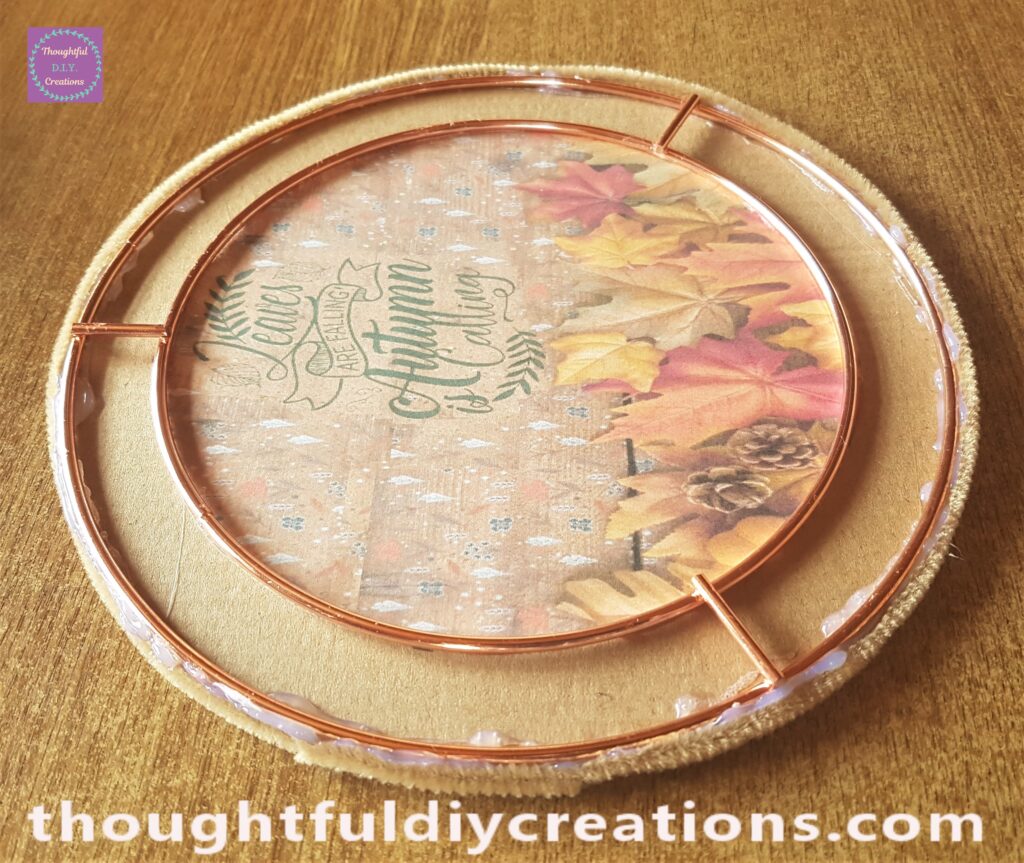 I put Hot Glue around the outer circle of the wreath to attach it to the cardboard straight away. I added the Pipe Cleaners around the Side of the Wreath with Hot Glue to cover the Cardboard.