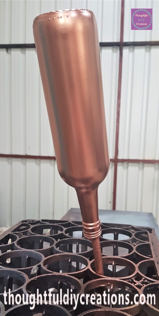 One even coat of Spray Paint on the Bottle.